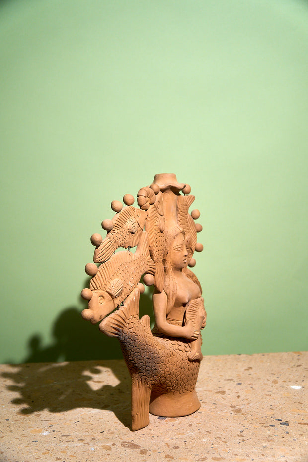 Sirena de candelabro