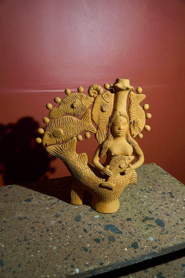 Sirena de candelabro